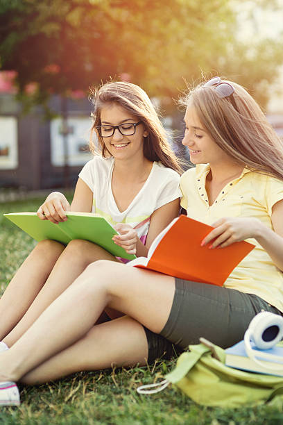 istock School girls studying in the campus 484601138