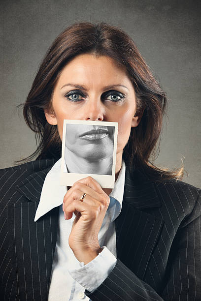 istock Business woman portrait with different mouth expression 484603245