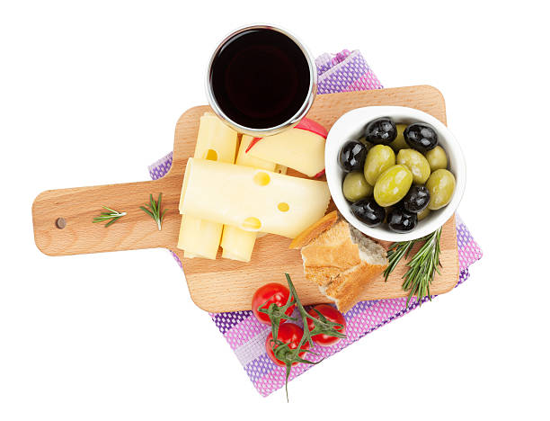 istock Red wine with cheese, bread, olives and spices 484603883