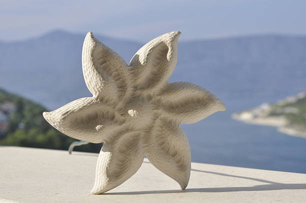 Beutiful white flower made of stone