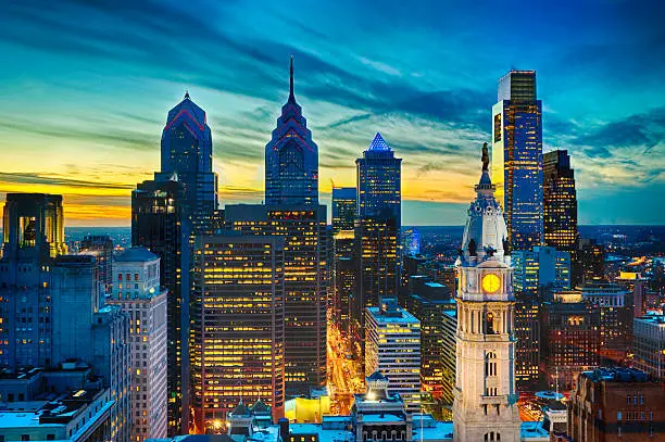 Philadelphia Skyline from the PSFS Building 33rd Floor in the Lowes Hotel at sunset with City Hall, Comcast Building, One and Two Liberty Place