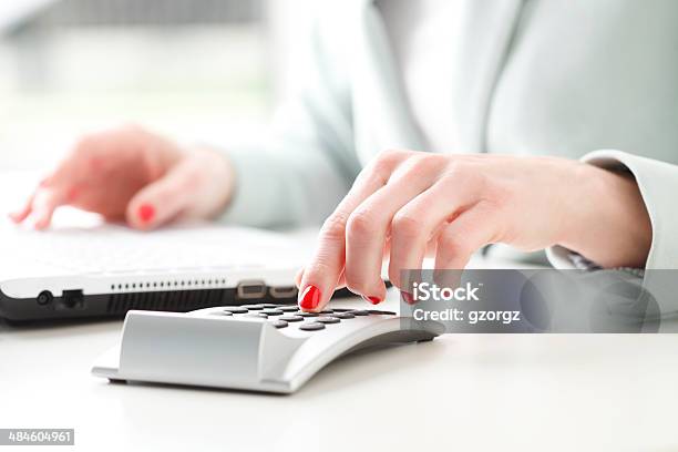 Businesswoman Analyzing Data Stock Photo - Download Image Now - Administrator, Adult, Advice