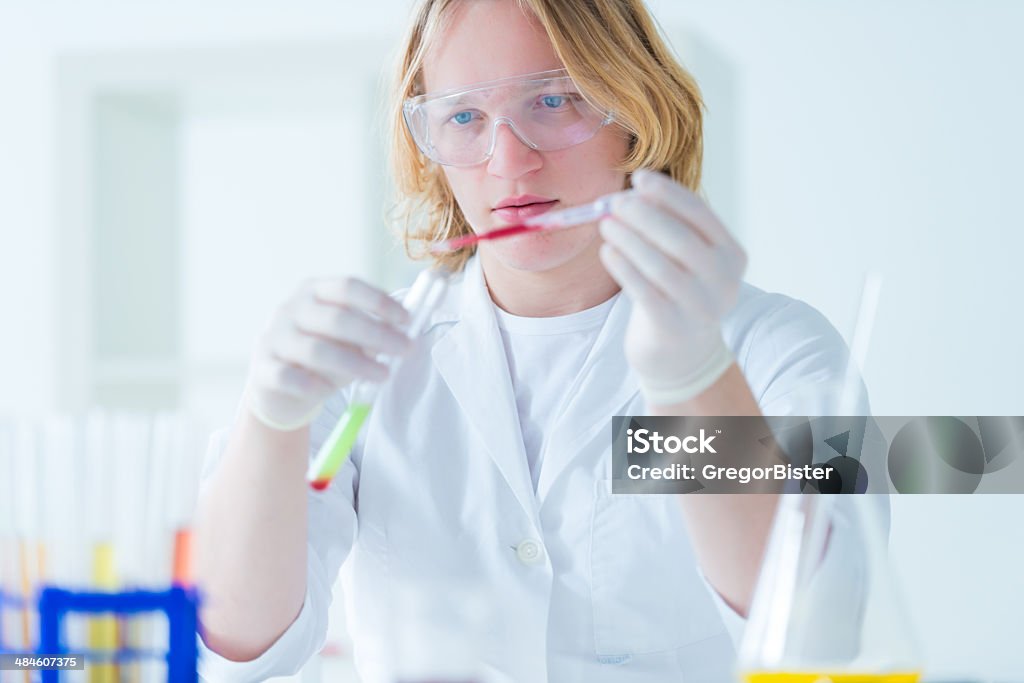 Researcher working with chemicals Accuracy Stock Photo