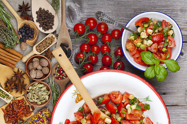 istock Delicious tomato salad an enamel bowl 484608151