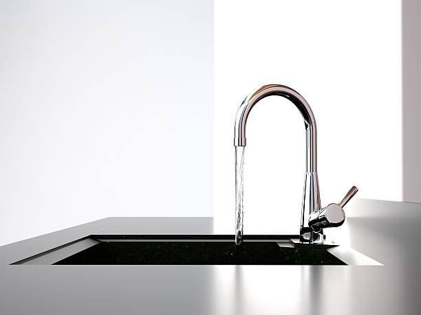 istock water flows from the tap to sink 484609276