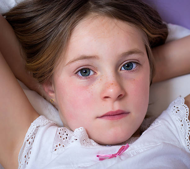 istock little girl waking up 484617751