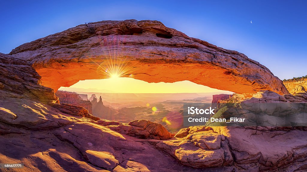 Mesa Arch Panorama Sunrise at iconic Mesa Arch  in Canyonlands National Park Moab - Utah Stock Photo