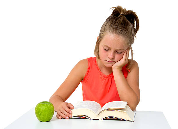 istock little girl reading a book 484618537