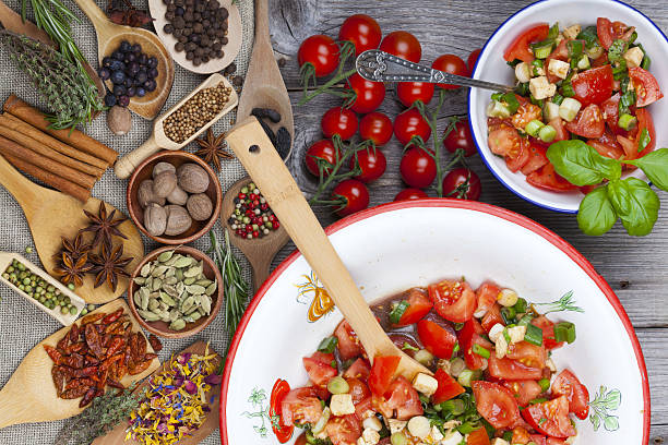 istock Close up tomato salad in a bowl with fork 484618965