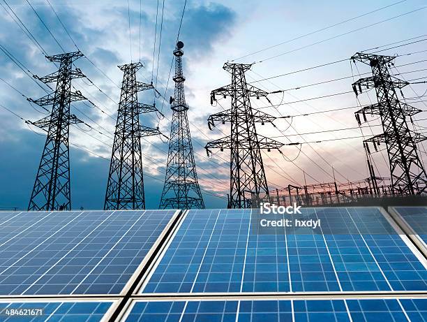 Photovoltaic Cells And High Voltage Post Stock Photo - Download Image Now - Biological Cell, Blue, Built Structure
