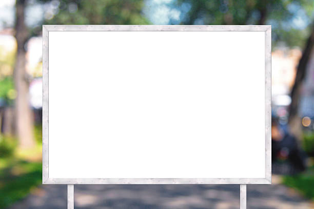 istock Blank banner with wooden frame on unfocused street background 484622120