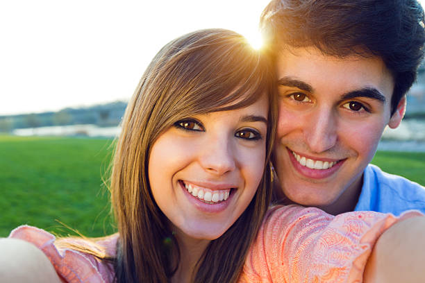 istock Selfie couple taking photos with a smartphone 484623565