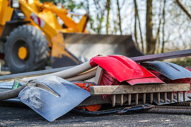 istock shovels and brooms 484624056