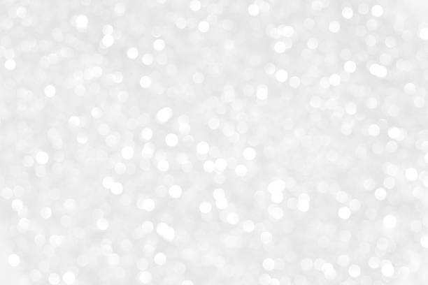 astratto sfondo sfocato bianco - glitter defocused illuminated textured effect foto e immagini stock