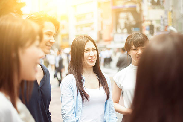 istock Young people  hanging out against cityscape 484628634