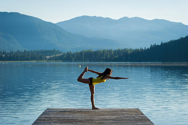 istock Royal Dancer Tranquil Lakeside meditation at sunrise 484628654