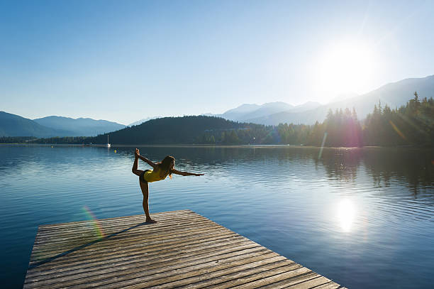 istock Royal Dancer Tranquil Lakeside meditation at sunrise 484628656