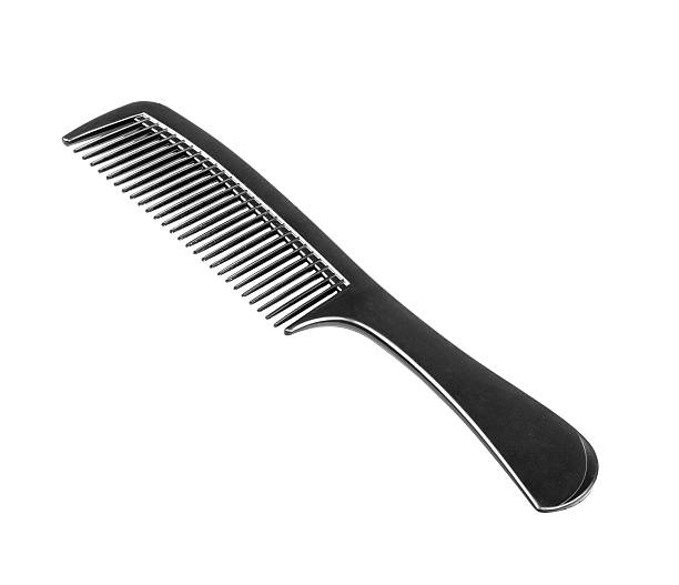 istock Black comb isolated on white close up look 484630280