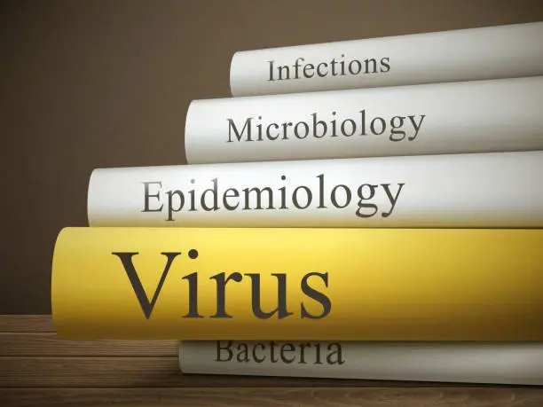 Vector illustration of book title of virus isolated on a wooden table