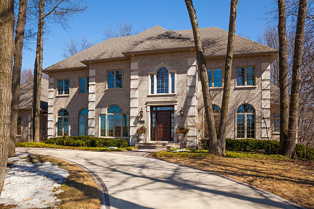 istock Stately Brick Mansion With Circular Drive, Mature Trees 484647885