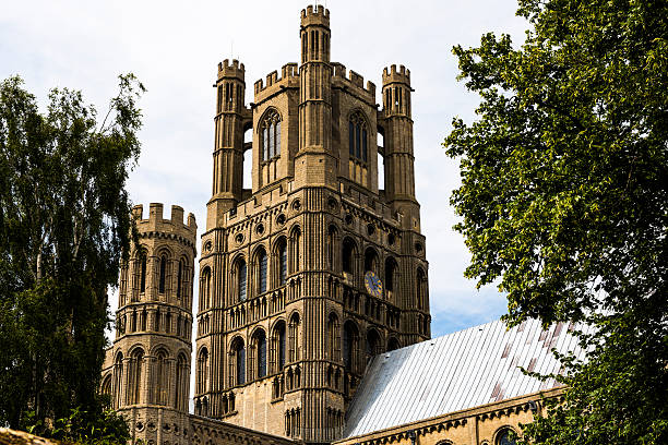 Beautiful Ely Cathedral which towers over the quaint city The beautiful Ely Cathedral, often know as "the Ship of the Fens" because of its prominent position above the surrounding flat landscape towers over the  streets of the picturesque city of Ely, located in Cambridgeshire, England. ely england photos stock pictures, royalty-free photos & images