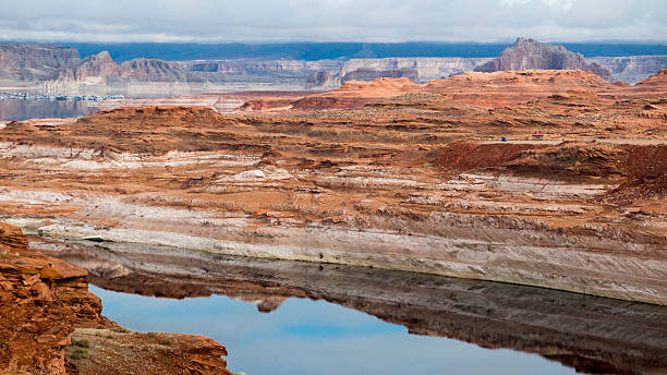 Lake Powell Spectacular scenery in the west, Lake Powell - Page - Arizona.  Afternoon on a cloudy day gunsight butte stock pictures, royalty-free photos & images