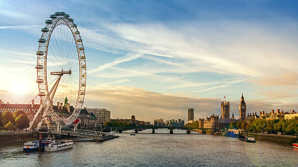 City of London sunrise London, England - October 22, 2010: Morning image of London. Includes the London eye, County Hall, Westminster Bridge, Big Ben and Houses of Parliament. london county hall stock pictures, royalty-free photos & images