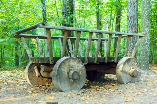 Old wooden horce cart in the forest