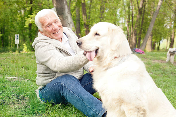 istock Senior man with his dog. 484651265