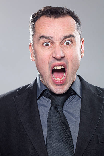 istock anger and surprise of corporate man 484652265