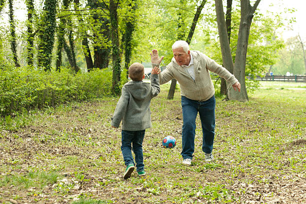 Grandfather and grandson enjoy a game