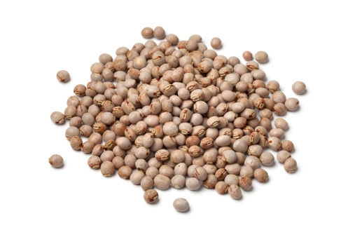 Heap of pigeon peas on white background