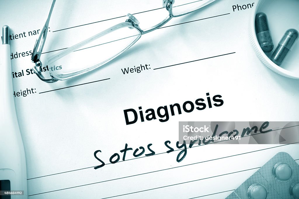 Diagnosis Sotos syndrome, pills and stethoscope. 2015 Stock Photo