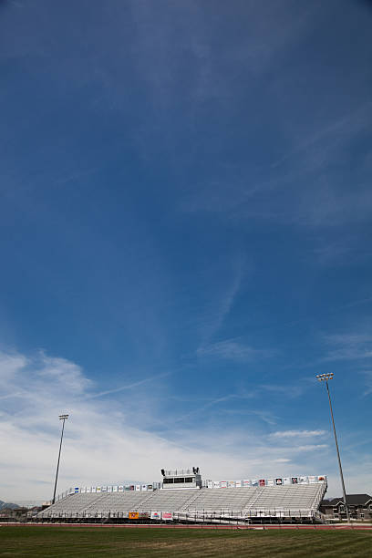 istock Sunny American stadium with  bleachers commentary box 484659106