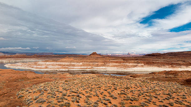 Lake Powell Spectacular scenery in the west, Lake Powell, afternoon on a cloudy day. Page - Arizona. gunsight butte stock pictures, royalty-free photos & images