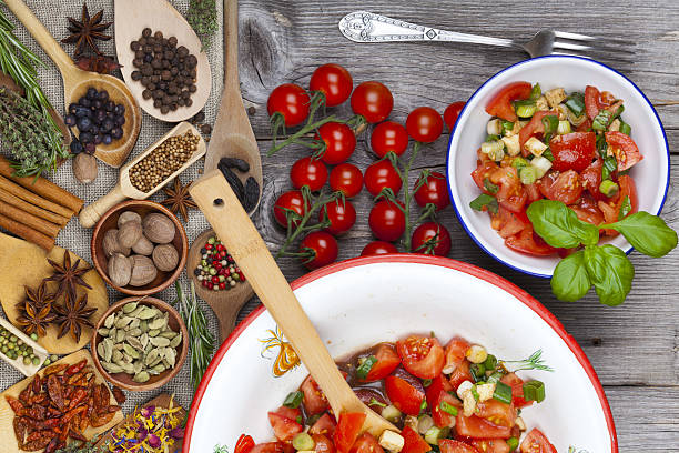 istock Delicious tomato salad an enamel bowl 484669787