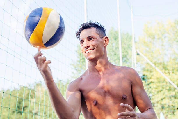 istock portrait of volleyball player while keeping balancing ball on a 484669998