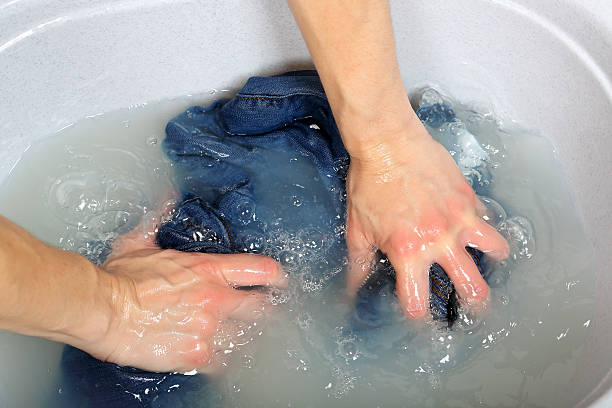 washing clothes stock photo