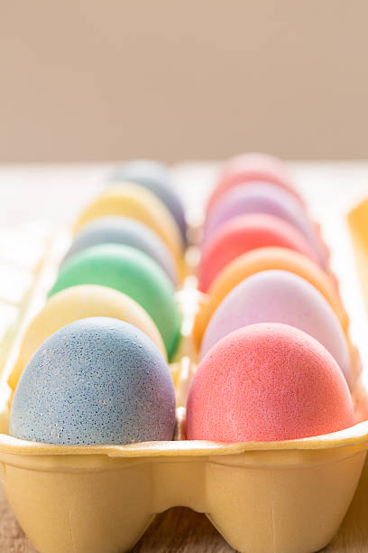 istock close up of Colored Easter Eggs in Carton 484671071