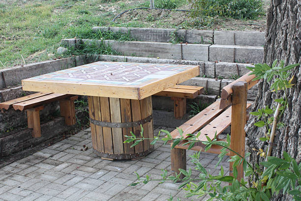 istock wooden table with wooden seats 484673512