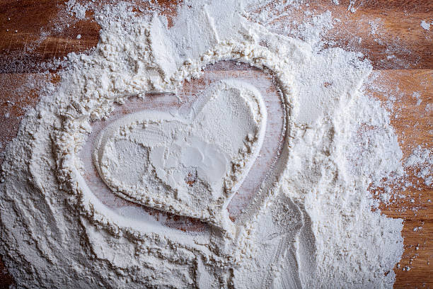 istock layer of flour to draw  heart on a cutting board 484674667