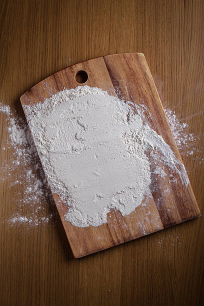 istock layer of flour on cutting board 484674745