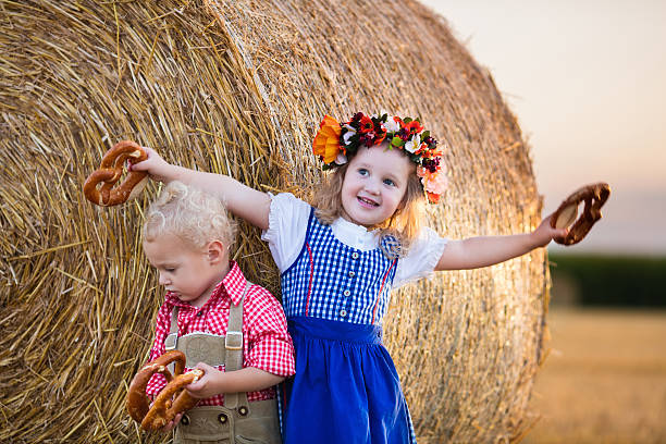 istock Kids playing in wheat field in Germany 484675272