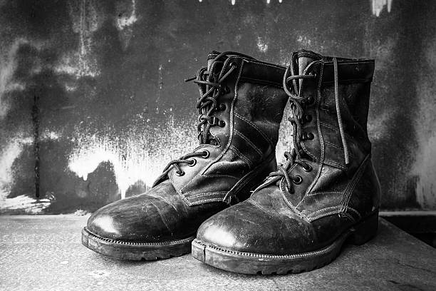 istock Boots shoe on wooden 484676278