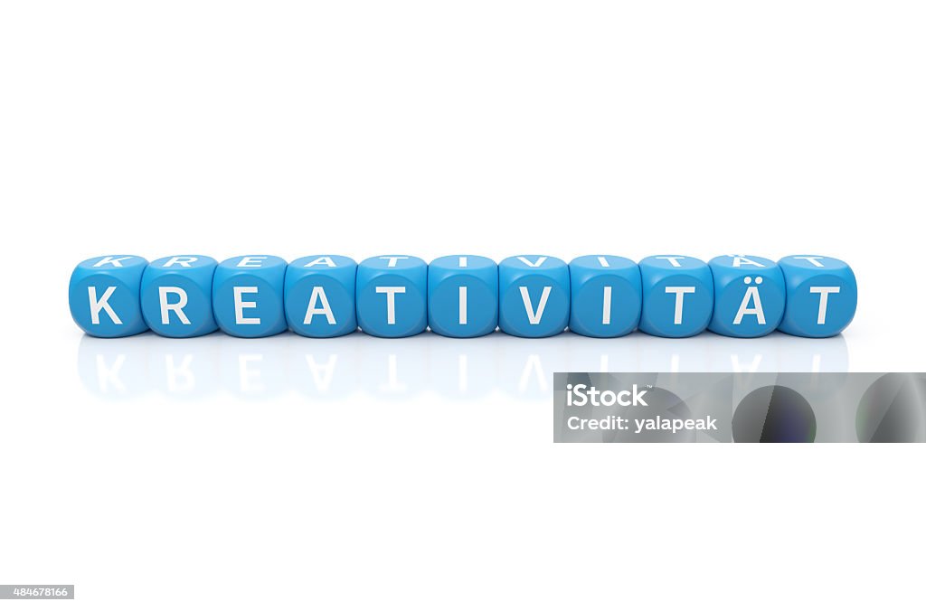 Creativity dices blue Blue dices with the word "Kreativität" isolated on white background. 2015 Stock Photo