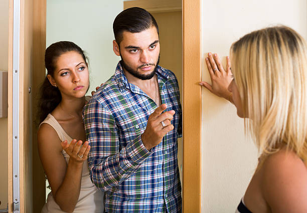 istock family couple having problems with drunk guest 484679400