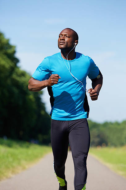 istock Sporty young man running 484679562