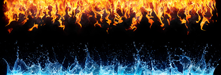 water and fire isolated on black background - opposite concept