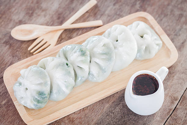istock Chinese leek steamed dessert on wooden table 484682726