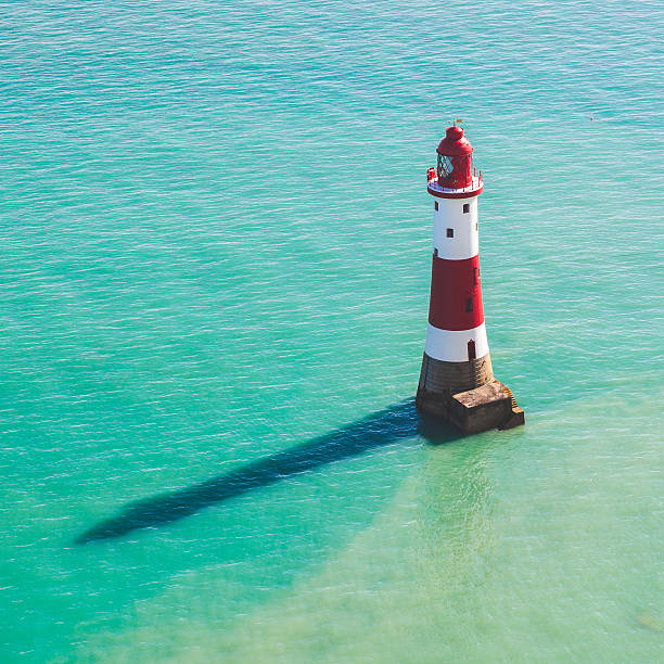 istock Lightouse and sea in southern England 484683348